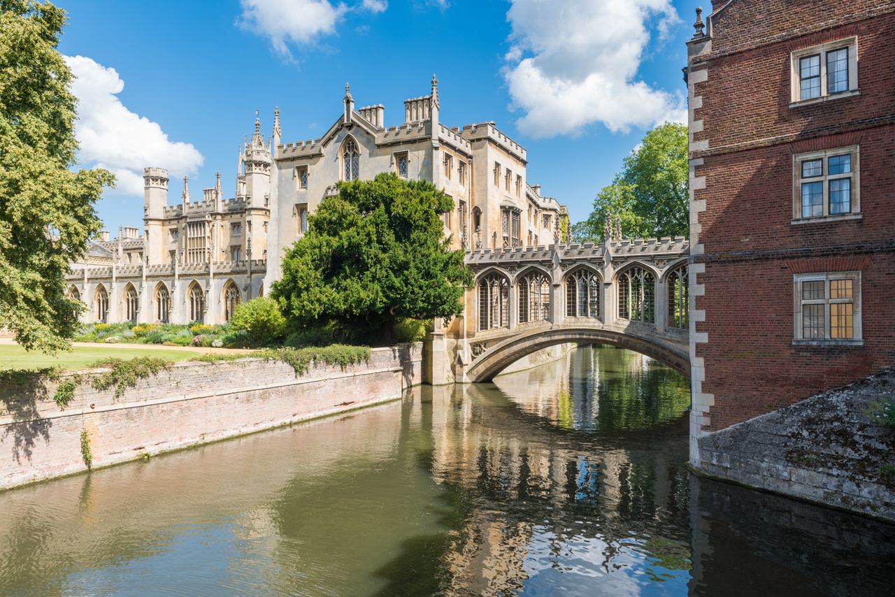About Picturesque view of St John's College with iconic bridge over the River Cam.