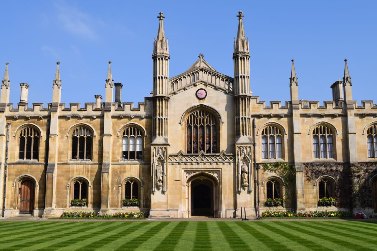 About Stunning Gothic architecture of a historic Cambridge college on a sunny day.