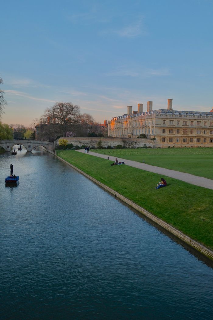 Crafting Captivating Headlines: Your awesome post title goes here Peaceful summer evening by the River Cam in Cambridge, UK with scenic architecture.